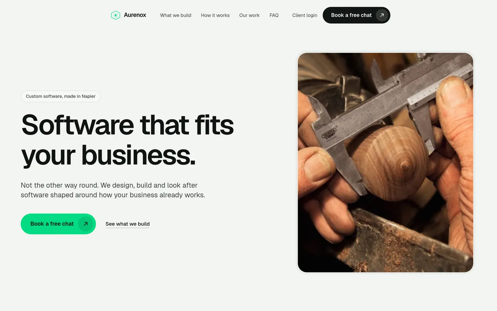 Aurenox Software homepage: “Software that fits your business,” beside a photo of a caliper measuring a turned wooden part.